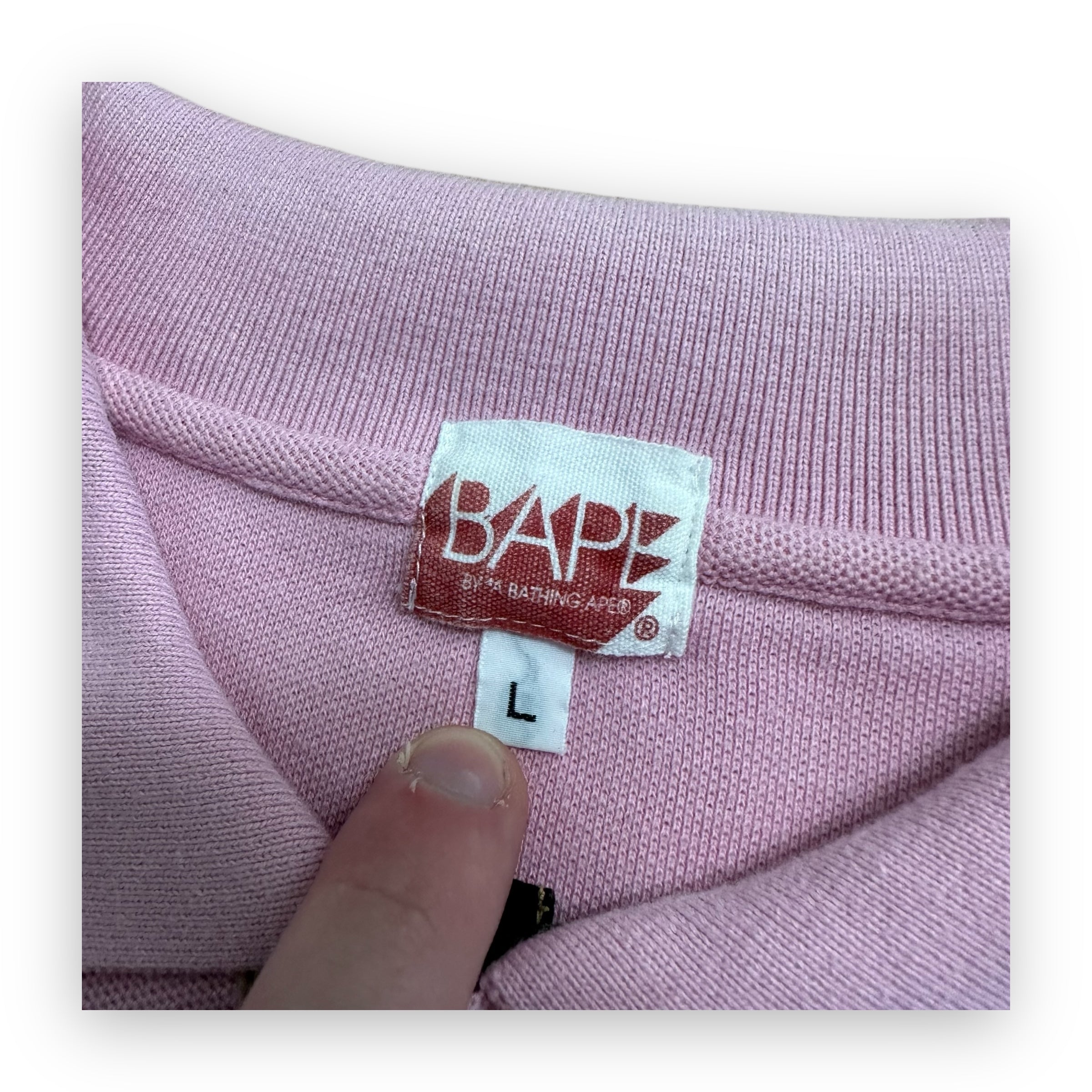 Polo BAPE x KAWS Pink
