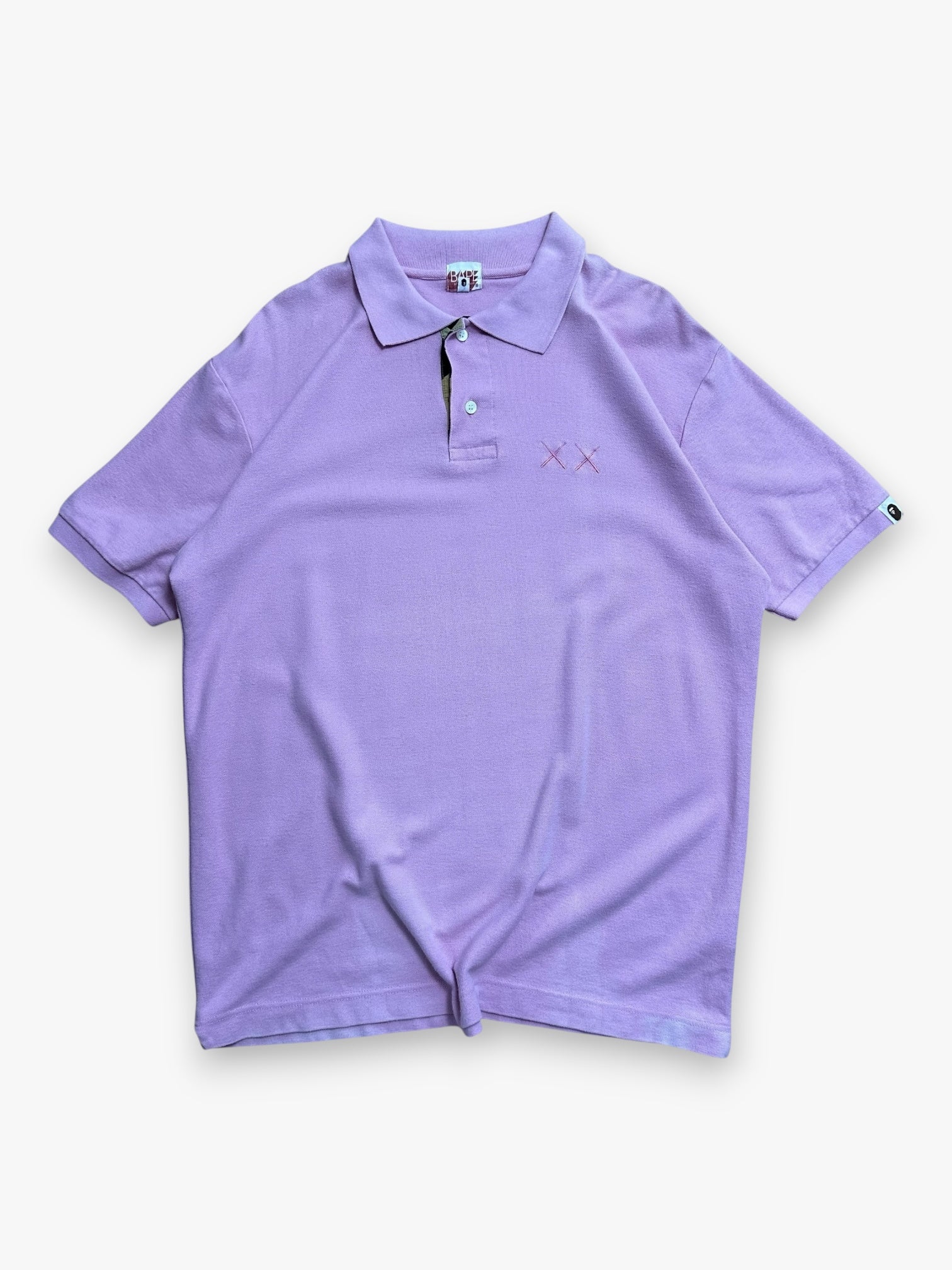 Polo BAPE x KAWS Pink