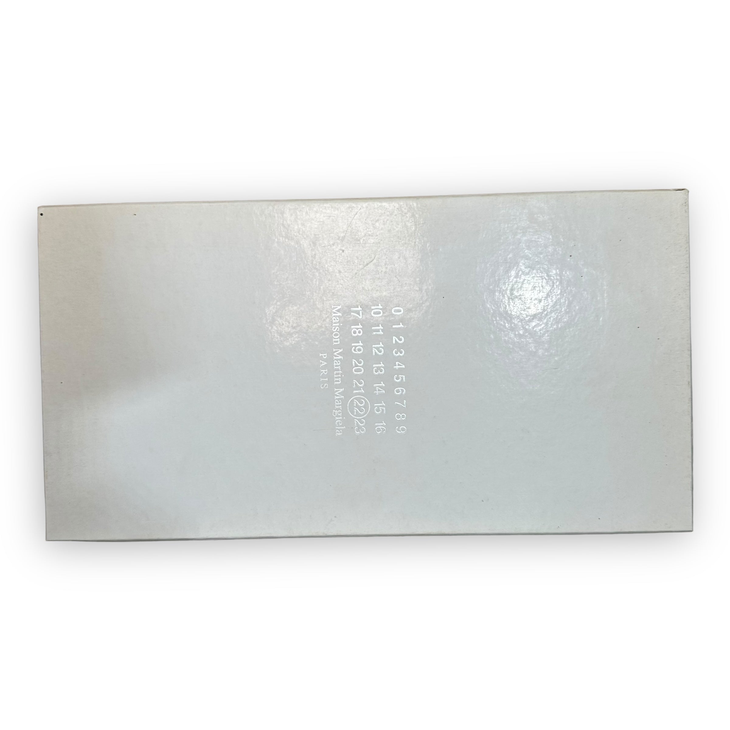 Maison Margiela Replica GAT Punch Hole Off White