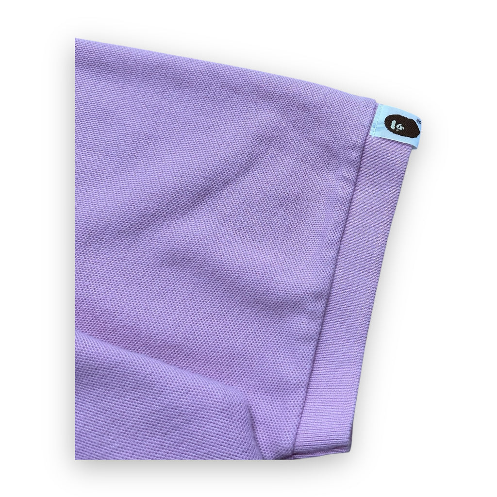 Polo BAPE x KAWS Pink